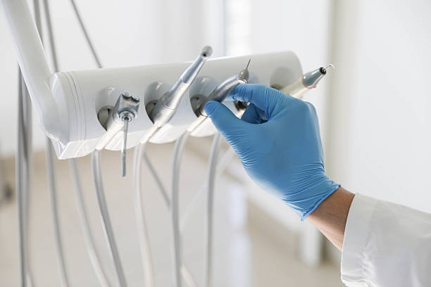 Professional Tooth Extraction technician working in Hughes County County, OK